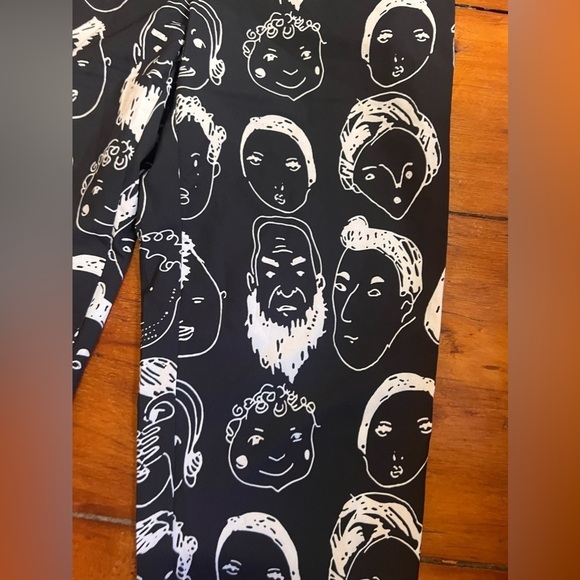 Urban Outfitters Shekou X-Small black pants with white faces EUC silky material - Picture 3 of 10